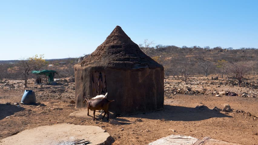The housing of African Bedouins of wild tribes made of animal skins and clay in the African savannah