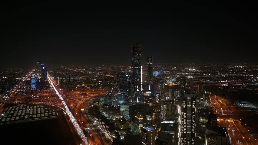 Drone aerial shot of KAFD at night in Riyadh, Saudi Arabia Royalty-Free Stock Footage #3412189937