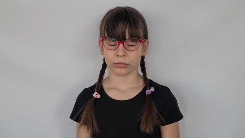 Teenage girl child holding yellow ribbon