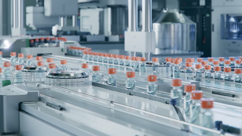 Large Conveyor Belt with Glass Vials inside Modern Pharmaceutical Factory. Medication Manufacturing Process. Medical Ampoule Production Line   Royalty-Free Stock Footage #3412335825