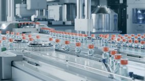 Large Conveyor Belt with Glass Vials inside Modern Pharmaceutical Factory. Medication Manufacturing Process. Medical Ampoule Production Line   - Powered by Shutterstock - Get 15% off with code: PIKWIZARD15