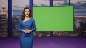 Woman host presenting newscast standing tv stage near green screen. Beautiful female newsreader lighting breaking news at multimedia channel. Elegant anchorwoman smiling reporting about daily events. - Powered by Shutterstock - Get 15% off with code: PIKWIZARD15
