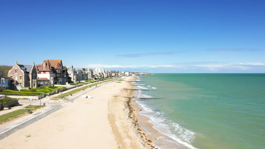 The landing beach of sword beach in Europe, in France, in Normandy, towards Ouistreham, in Lion sur Mer, in spring, on a sunny day.