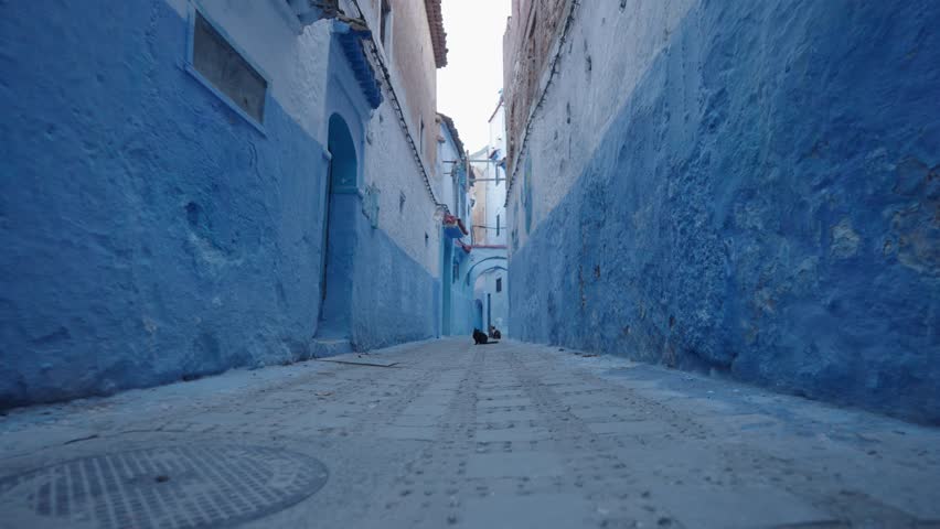 Narrow Street Alleyway Maze in Chefchaouen Chaouen The Blue Pearl City in the Rif Mountains of northwest Morocco Royalty-Free Stock Footage #3412522741