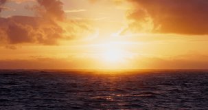 Sun rising up over ocean horizon , vibrant bright sunrise seascape with color sky clouds and caribbean sea waves video