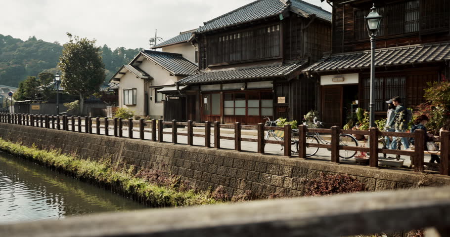 Japan, architecture or water canal by houses in countryside, sustainable trees or nature in outdoor for conservation. Tokyo, home design or garden landscaping, plants or green ecology in environment