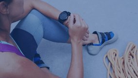 Animation of clock over caucasian woman with smartwatch and climbing rope. Global sports, science, computing, digital interface and data processing concept digitally generated video. - Powered by Shutterstock - Get 15% off with code: PIKWIZARD15