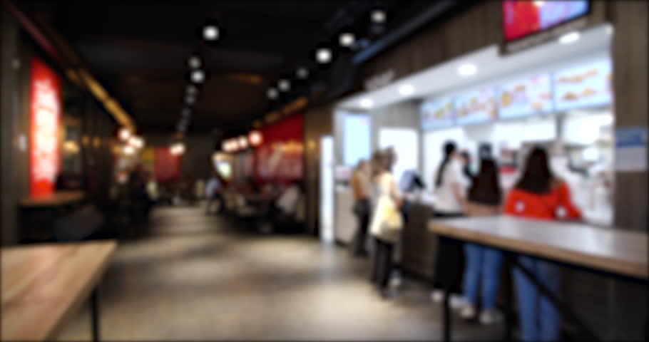 Time Lapse video of People Walking and Ordering from a Fast Food restaurant. Blurred background 4K video Royalty-Free Stock Footage #3412817919