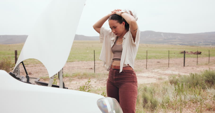 Frustrated woman, stress and car trouble in nature with problem, mechanical fault or stuck in countryside. Female person in anxiety for vehicle breakdown help, roadside assistance or stranded outdoor Royalty-Free Stock Footage #3412914301