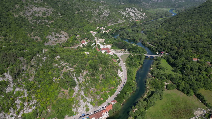 Montenegro. The valley of the Crnojevica River. Neighborhood of Lipovik village. Old Roman bridge. Shooting from a drone.