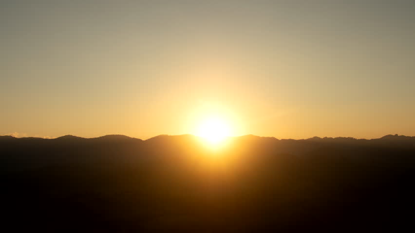Sunset time lapse, Dramatic sundown over a mountains view and clear sky Royalty-Free Stock Footage #3413138387