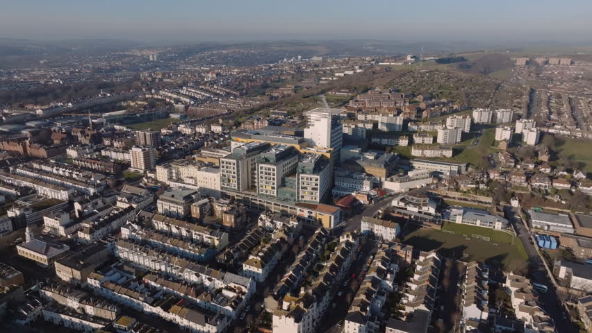 Drone footage of the Royal Sussex County Hospital in Brighton, Sussex Royalty-Free Stock Footage #3413145689
