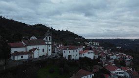 This video shows a town in Portugal from a very pleasant aerial view.
