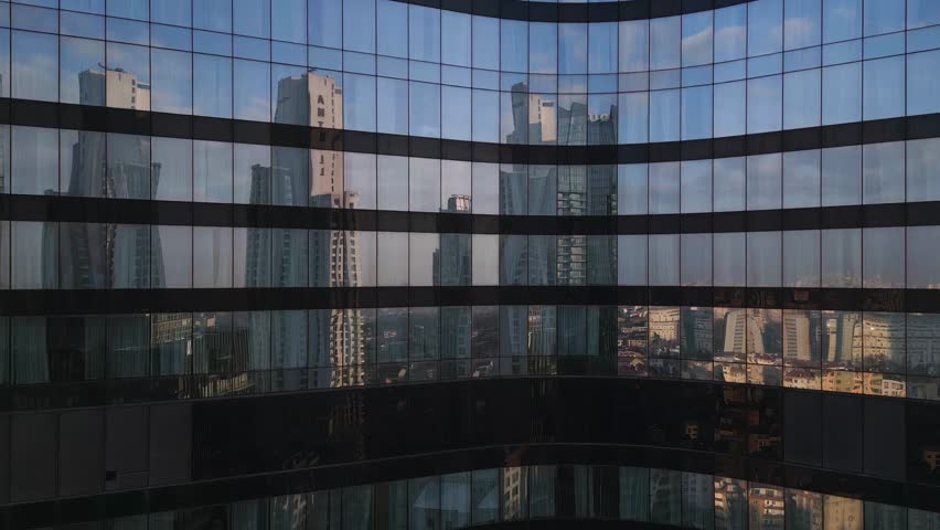 Istanbul's glass and concrete skyscrapers, home to offices, hotels, and residential complexes. Aerial drone view