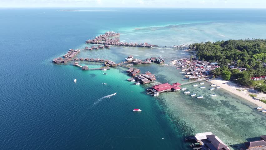 Drone view of Mabul Island, the base for diving in Sipadan Island, Sabah state in Malaysia.