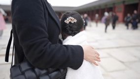Slow-motion video of a Korean girl wearing Chimachogori at Gyeongbokgung Palace in Seoul, South Korea
