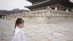 Slow-motion video of a Korean girl wearing Chimachogori at Gyeongbokgung Palace in Seoul, South Korea
