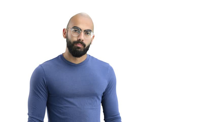 A man, on a white background, in close-up, points to the side