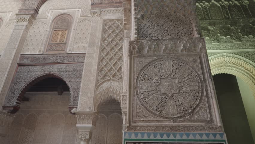 Al Attarine Madrasa Fes Fez, Morocco - 14th-century school for Islamic studies featuring ornate tile work and dramatic architecture