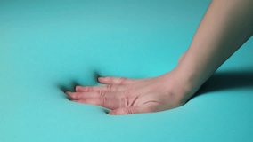 Person's hand presses on memory foam mattress. Shape restoration. It's a soft layer of bed. Elastic foam rubber, polyurethane foam material. Good sleep concept. Comfort and body care. High quality 4k. - Powered by Shutterstock - Get 15% off with code: PIKWIZARD15