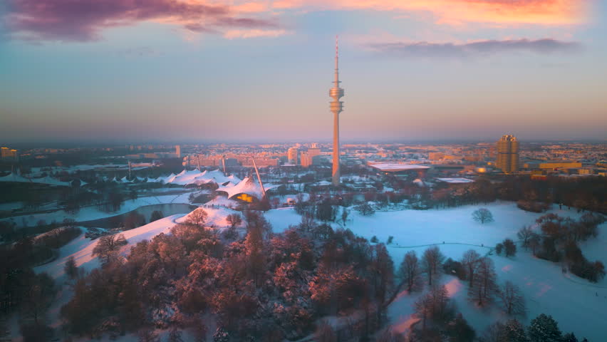 Munich city skyline aerial view drone footage of city munich germany fly over olmpiy park in front munich tv tower munich winter with snow germany. Royalty-Free Stock Footage #3413495525