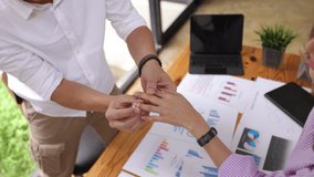 Man proposing to woman at work, Man wear a proposal ring in the office, Valentine's day. - Powered by Shutterstock - Get 15% off with code: PIKWIZARD15