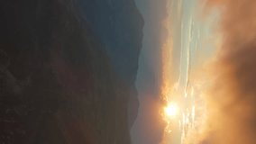 Aerial view of spectacular sunset on the mountain valley. Beautiful view in Durmitor National Park, Montenegro, Europe. Vertical video