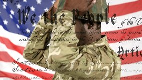 Animation of text of constitution over african american male soldier with usa flag. Patriotism and celebration concept, digitally generated video. - Powered by Shutterstock - Get 15% off with code: PIKWIZARD15