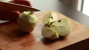woman hands cutting slicing apples close up - Lifestyle Cooking in Action