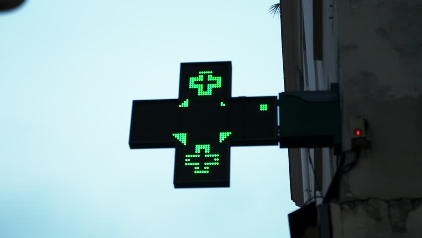 Pharmacy green cross neon sign with COVID messages flickering in street of Paris 11 in France 2024 Royalty-Free Stock Footage #3413758557