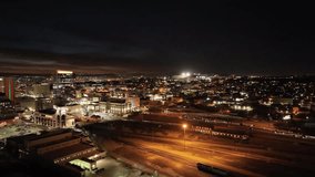 El Paso, Texas skyline at night with drone video showing traffic moving left to right.