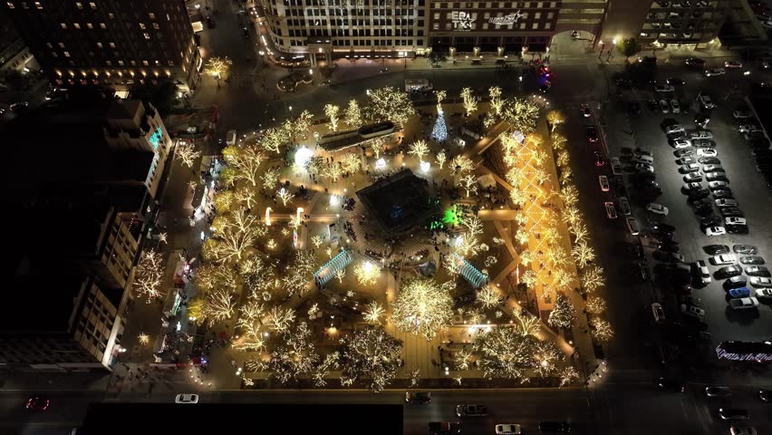 Plaza with Christmas lights in downtown El Paso, Texas at night with stable drone video.