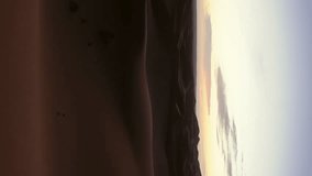 Beatiful landscape in Sahara desert at sunrise, timelapse. Vertical video