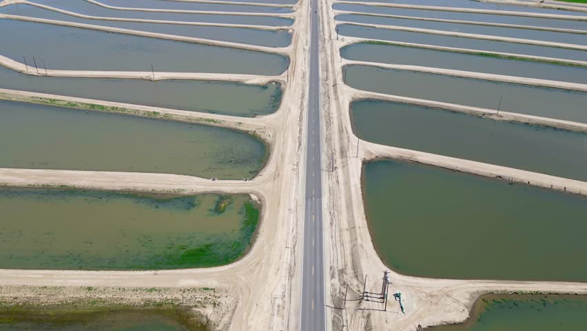 Aerial view of irrigation water tanks and access road at Bakersfield, California.