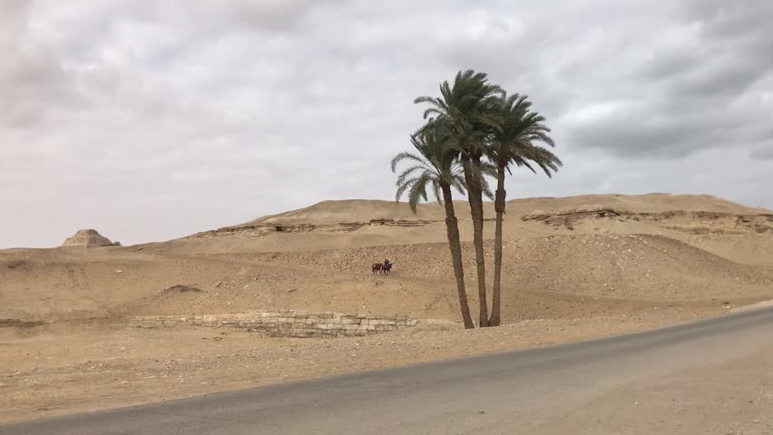 Ancient Egyptian pyramids in the middle of the desert, Saqqara, Egypt.  