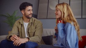 young woman gives a gift in a red box to her partner Valentine's Day Celebration - Powered by Shutterstock - Get 15% off with code: PIKWIZARD15