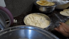Uttarakhand Culinary Heritage: Cinematic Indian Roti (Chapati) Making - Traditional Bread Preparation in Northern India.