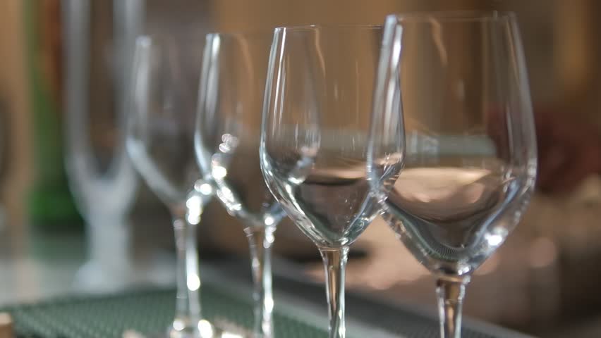 Glamorous and sophisticated glass of wine, bubbly, sparkling, wine glass, white wine, Algarve, Portugal. Royalty-Free Stock Footage #3414431519