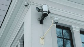 Security technology: Wall-mounted CCTV camera at an office