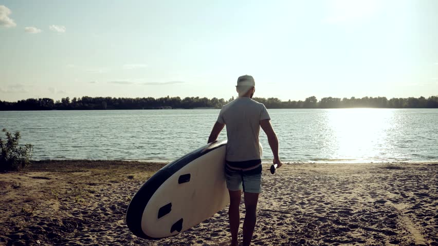 Paddleboarder Sport Sup Surfing. Recreation Paddling Sup Surfboard. Inflatable Board Rowing. Surfer Recreation Sport Watersport Activity. Water Tourism Recreation.Raft SUP. Paddler Surfing Exploration Royalty-Free Stock Footage #3414494237