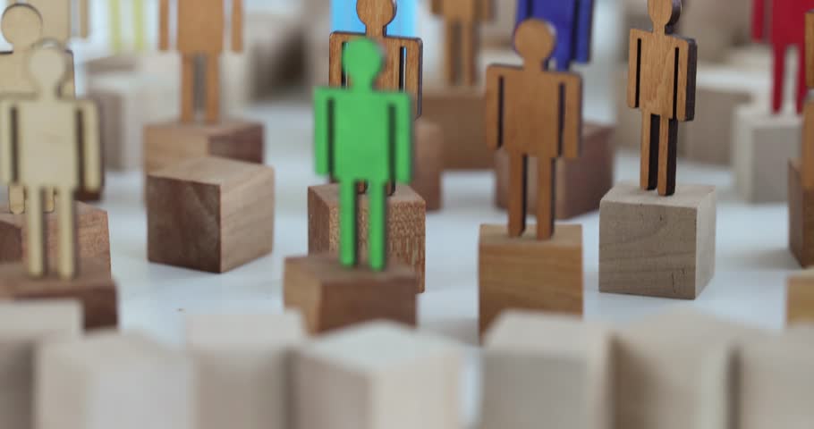 Multicolored wooden figures of people with creative abilities. Individual characteristics of a person concept Royalty-Free Stock Footage #3414536507