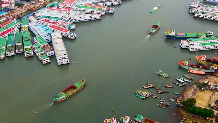 Aerial View Of Ships And Boats Over Dockyard Along Buriganga River In Dhaka City Port, Bangladesh.