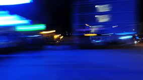 Long exposure side view of city streets at night, driving at high speed, traveling through urban environment, light streaks and vibrant colors - Powered by Shutterstock - Get 15% off with code: PIKWIZARD15