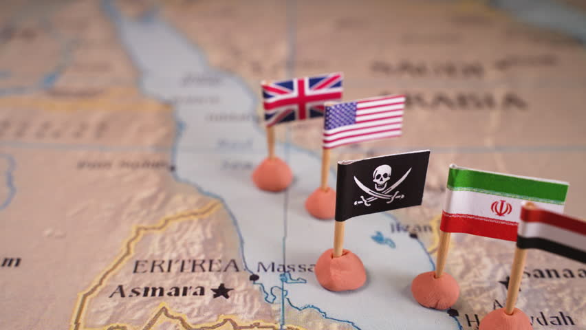 Flags of the United States and Iran and their respective allies surrounding a pirate insignia onto a map of the Red Sea region. It symbolically represents the intricate geopolitical dynamics and Royalty-Free Stock Footage #3414764389
