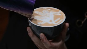 A Barista showing how to make a Latte Art. - Powered by Shutterstock - Get 15% off with code: PIKWIZARD15
