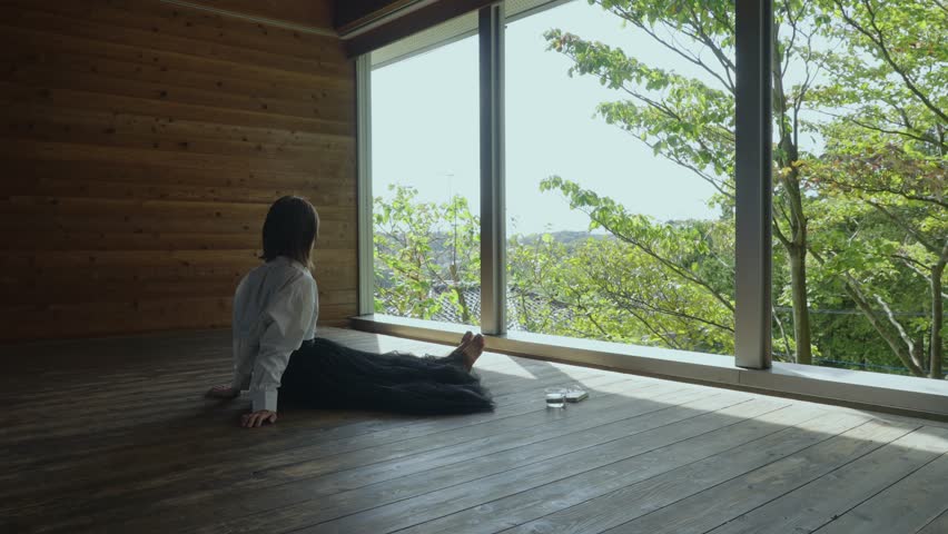 A woman relaxing in a stylish room