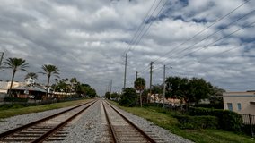 4k video of the railway tracks running through Delray Beach in Florida, USA