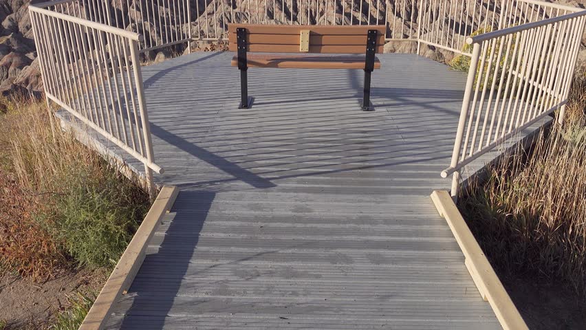 A bench at a lookout in the Badlands National Park, South Dakota, USA