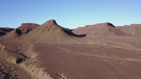 4K high quality aerial video scenic drone view of barren desolate waterless mountain landscape near Orange River and area of border town Noordoewer on sunny afternoon in Namibia, southern Africa