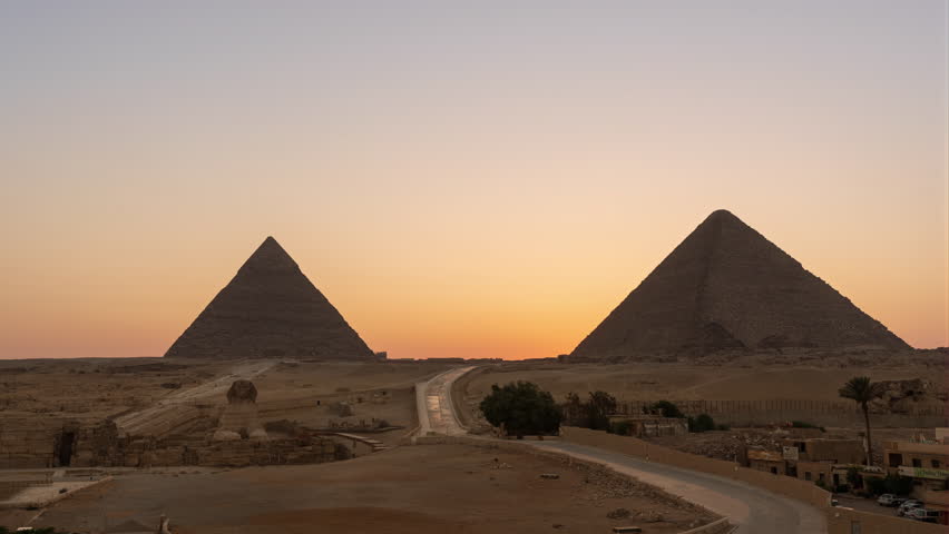 Day to night timelapse and the light show of the 2 biggest pyramids in Giza near Cairo 